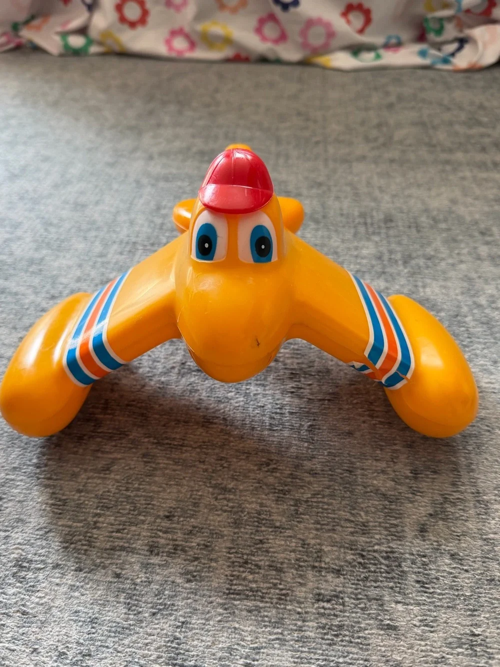 Vintage 1980s airplane toy- red hat and stripes on wings